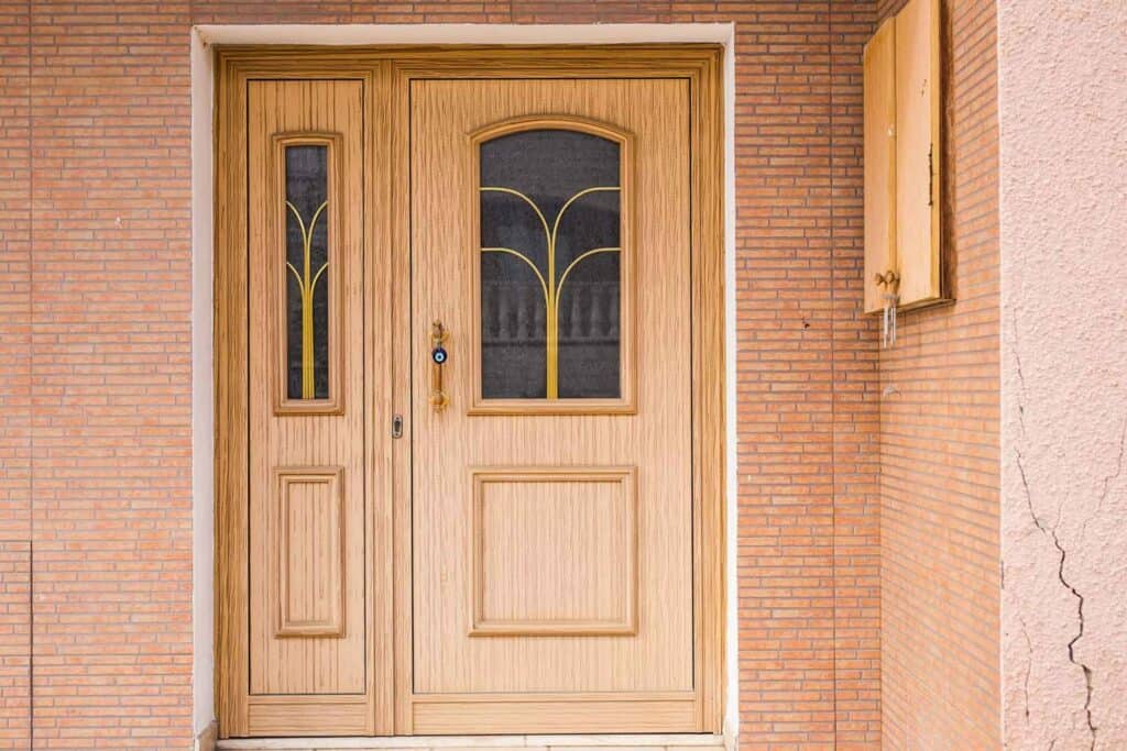 wooden-front-door-of-a-home-PKHAWWU-1536x1024